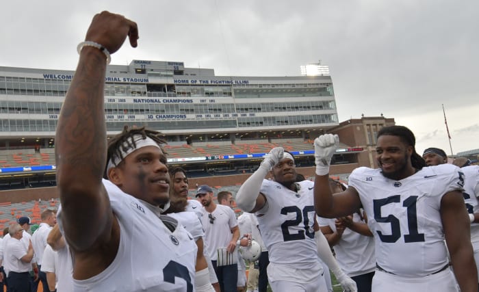 The Penn State Nittany Lions celebrate their 30-13 win over Illinois at Memorial Stadium in Champaign, Illinois.